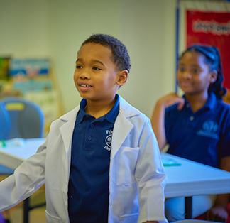 Group of students working together on the classroom floor